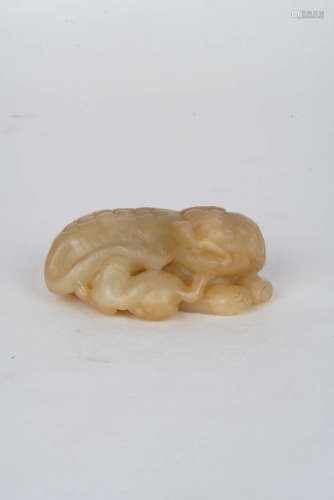 A Chinese Auspicious Beast Carved Hetian Jade Ornament