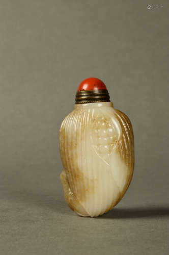 A Chinese Carved Hetian Jade Snuff Bottle