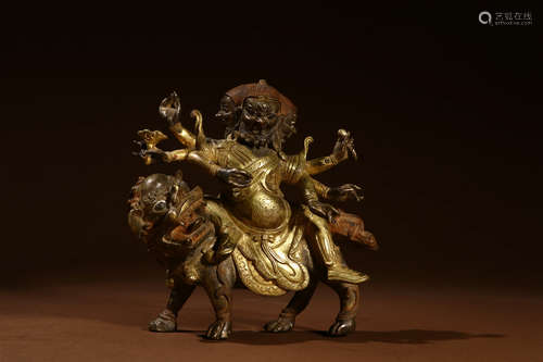 A Chinese Gilded Copper Dharmapala Statue