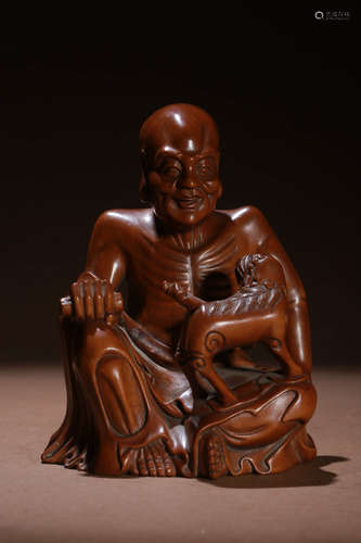 A Chinese Boxwood Carved Buddha Statue