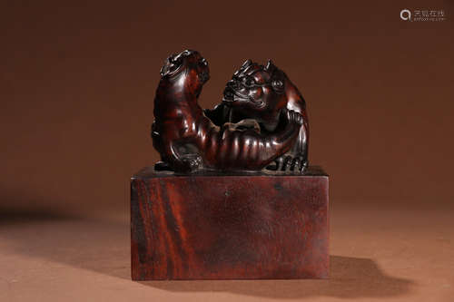 A Chinese Red Sandalwood Carved Beast Seal