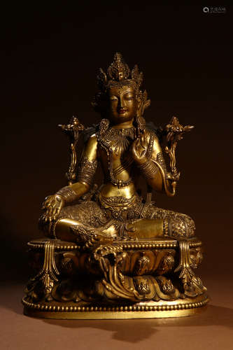 A Chinese Gilded Copper Green Tara Statue