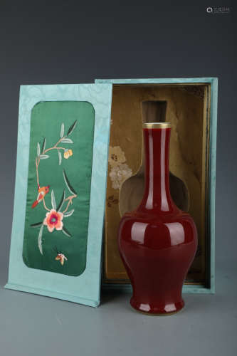 A Chinese Porcelain Vase with Embroidery Box