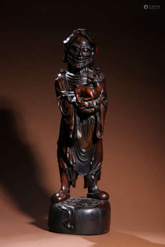 A Chinese Red Sandalwood Carved Arhat Statue