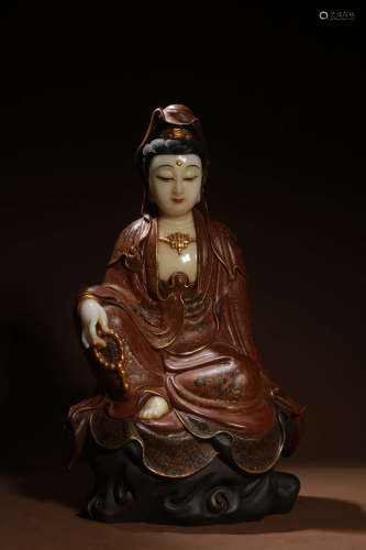A Chinese Hanbai Jade Guanyin Statue