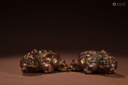 A Pair of Chinese Rosewood Carved Pixiu Ornaments
