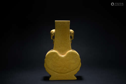 Qing dynasty yellow glaze carved flat vase with dragon pattern