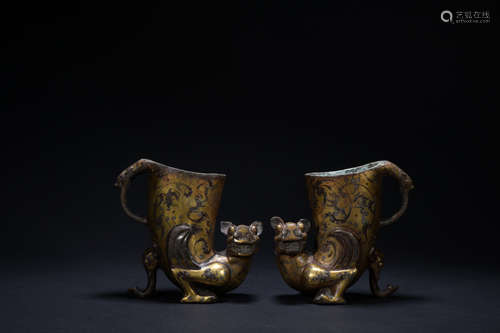 Qing dynasty gilt bronze wine cup inlaid with silver