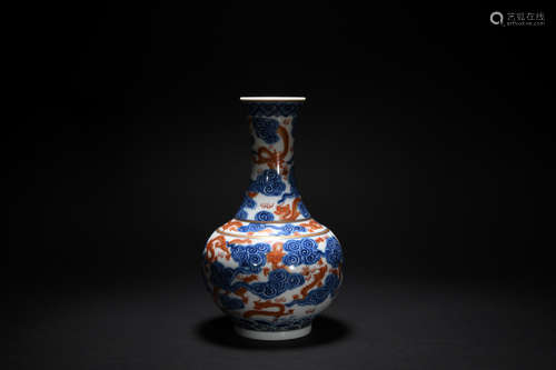 Qing dynasty blue and white iron red glaze vase with dragon pattern