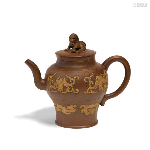 An Yixing teapot with slip decorated dragons  Qing dynasty