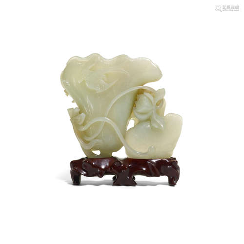 A carved jade lotus and bird group  Late Qing/Republic Period