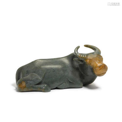 A green jade carving of a recumbent ox  Ming style