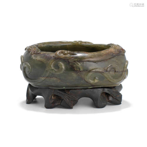 A carved spinach jade water coupe   Qianlong mark, Late Qing/Republic period