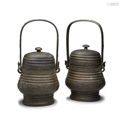 A PAIR OF ARCHAISTIC CAST BRONZE VESSELS  Qing dynasty