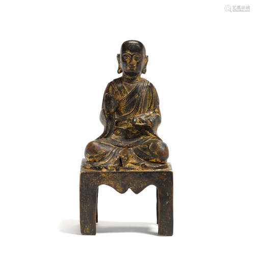 A BRONZE FIGURE OF A LUOHAN  dated to Jiajing (1521-1567) first year by inscription