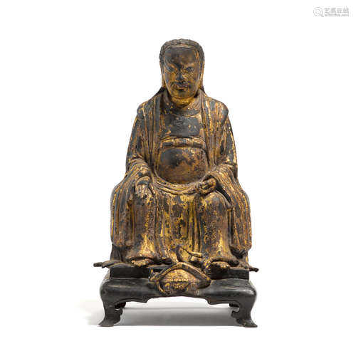 A CAST GILT-LACQUERED BRONZE FIGURE OF ZHENWU  17TH century