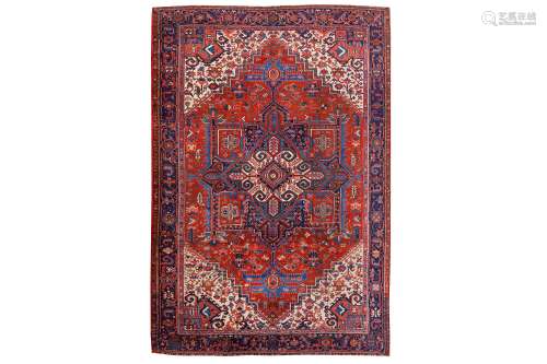 AN ANTIQUE HERIZ CARPET, NORTH-WEST PERSIA