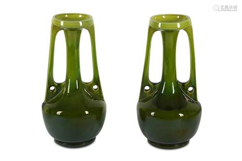 A pair of Bretby Art Nouveau twin handle vases,