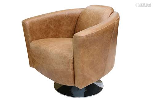 A contemporary Aviator style tan leather tub chair