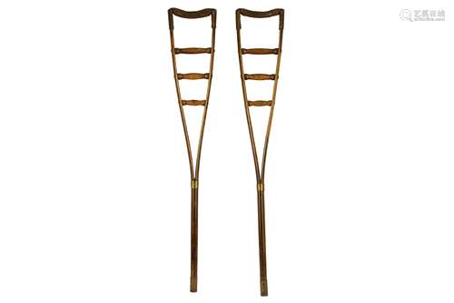 A pair of Victorian era oak bent wood crutches