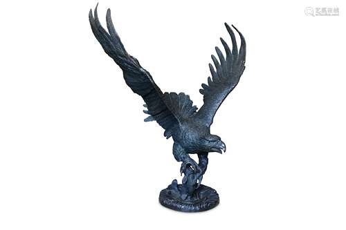 A MONUMENTAL BRONZED METAL FIGURE OF AN EAGLE IN FLIGHT