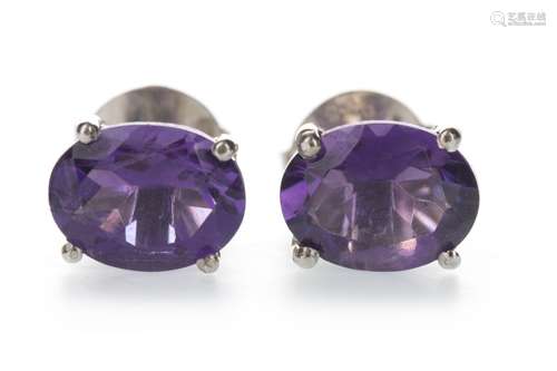 A PAIR OF AMETHYST STUD EARRINGS