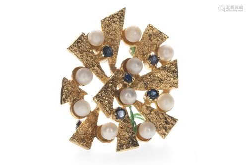 A BLUE GEM SET AND PEARL BROOCH