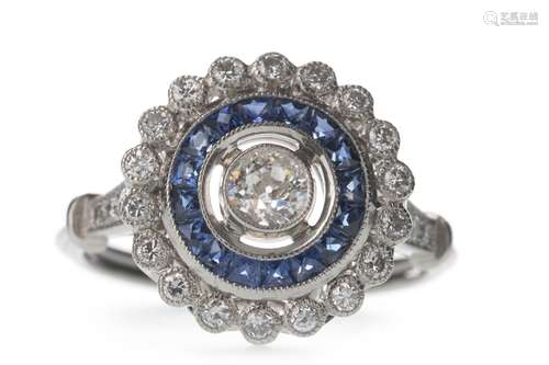 A SAPPHIRE AND DIAMOND RING