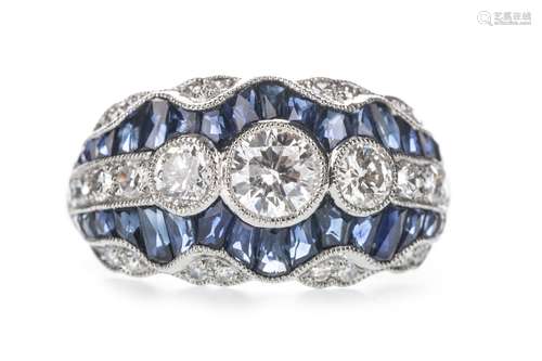 A SAPPHIRE AND DIAMOND RING