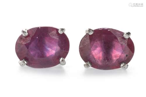 A PAIR OF TREATED RUBY EARRINGS