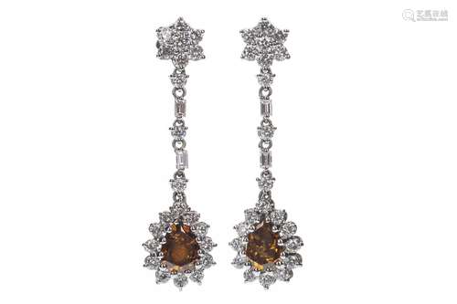 A PAIR OF GIA CERTIFICATED FANCY COLOUR DIAMOND EARRINGS