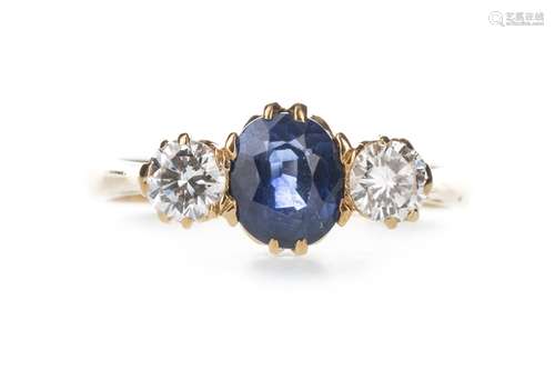 A BLUE GEM SET AND DIAMOND RING