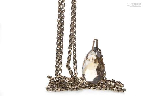 A GUARD CHAIN WITH GEM SET PENDANT