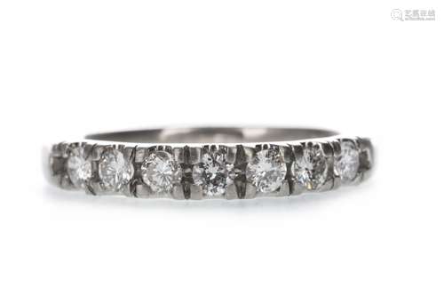 A DIAMOND SEVEN STONE RING