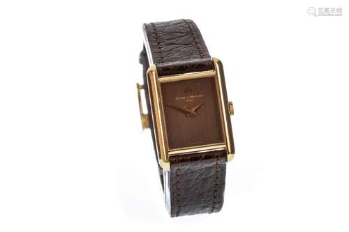 A LADY'S BAUME & MERCIER GOLD WATCH