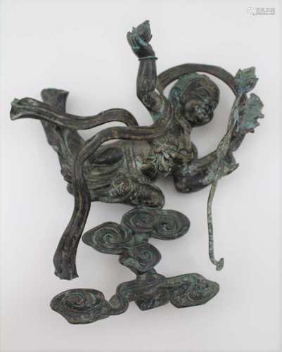 A CHINESE BRONZE CHILD BUDDHA, holding a lotus flower and bud, riding stylised clouds, c.1800,