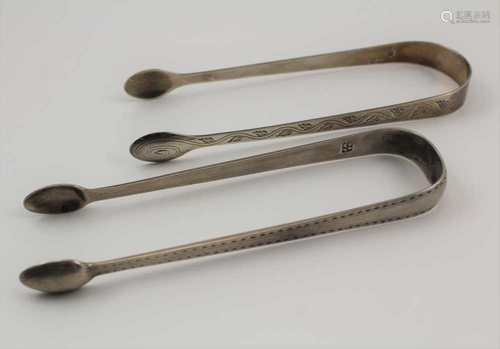 TWO GEORGIAN SILVER SUGAR BOWS, bright cut decoration, combined weight; 61g