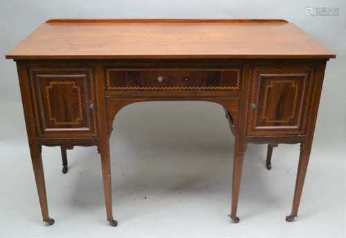 A LATE 19TH CENTURY MAHOGANY FINISHED SIDEBOARD with plain rectangular top, over chequered inlaid