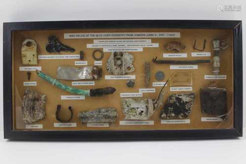 A FRAMED COLLECTION OF WWII GERMAN AIRCRAFT FRAGMENTS from Junkers JU88A-5, 0157, 11/KG1, shot by AA