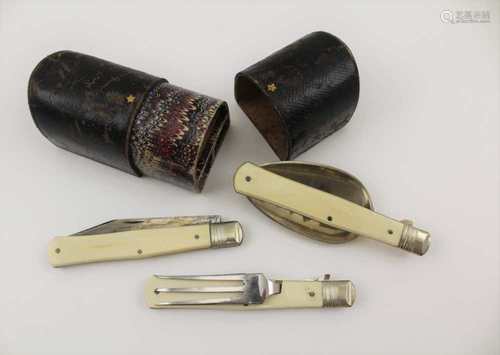 A VICTORIAN CAMPAIGN CASED SET OF THREE FOLDING EATING UTENSILS, comprising knife, fork & spoon