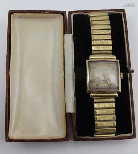 A 14K CASED GENTLEMAN'S SQUARE FACE WRISTWATCH, Arabic numerals and secondary indicator, on a 