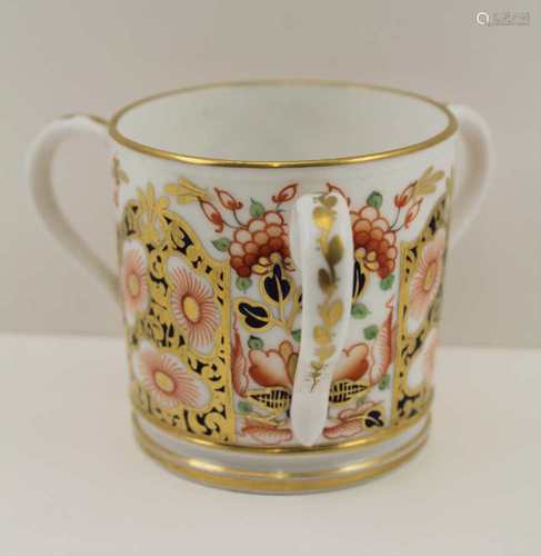 A 19TH CENTURY CROWN DERBY PORCELAIN TYG, painted and gilded in the Imari palette, 6cm high (red