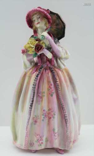 A ROYAL DOULTON PORCELAIN FIGURINE 