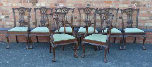 A SET OF EIGHT CHIPPENDALE DESIGN MAHOGANY FINISHED DINING CHAIRS, with fancy carved and pierced