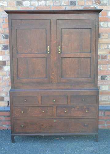 A 19TH CENTURY OAK PLAIN FORMED LINEN PRESS, the upper section having two plain panelled doors,