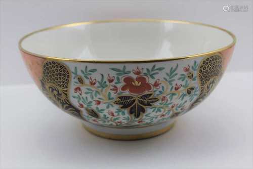 A CERAMIC BOWL gilded and painted in the Imari palette, stylised floral decoration, 25cm in diameter