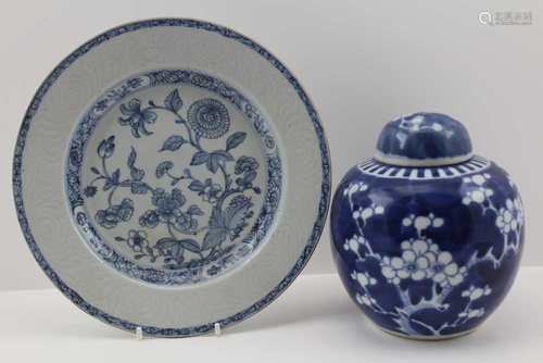 A CHINESE PORCELAIN PLATE, relief moulded rim, blue floral decoration, 22cm in diameter, together