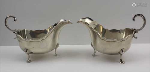 ADIE BROTHERS LTD. A PAIR OF GEORGIAN DESIGN SILVER SAUCE BOATS, 