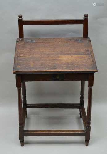 AN EARLY 19TH CENTURY OAK BIBLE BOX later converted to a clerk's desk, with plain super structure,