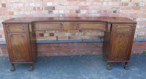 A WILLIAM IV LARGE MAHOGANY TWIN PEDESTAL SIDEBOARD having reeded edge top, over two central